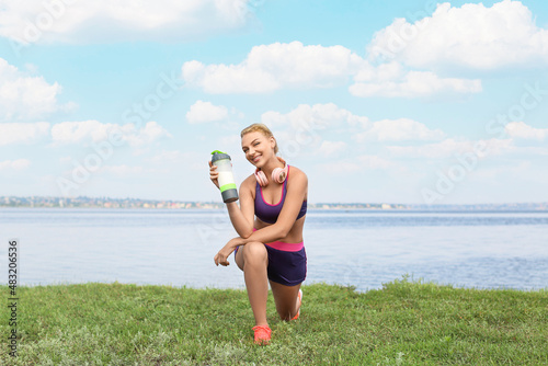 Beautiful young woman train...