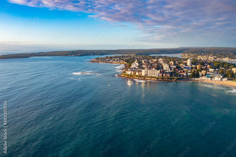 Panoramic aerial drone view of Cronulla in the Sutherland Shire, South Sydney, looking south toward Port Hacking during summer in the early morning  