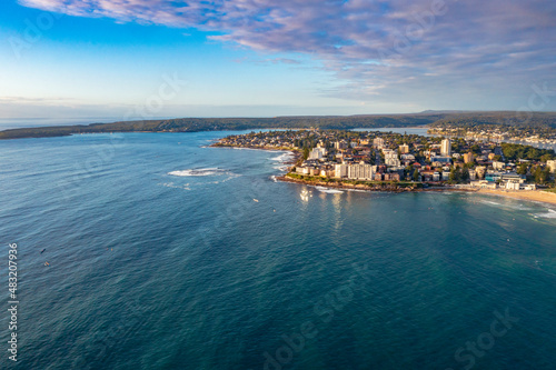 Panoramic aerial drone view of Cronulla in the Sutherland Shire, South Sydney, looking south toward Port Hacking during summer in the early morning 