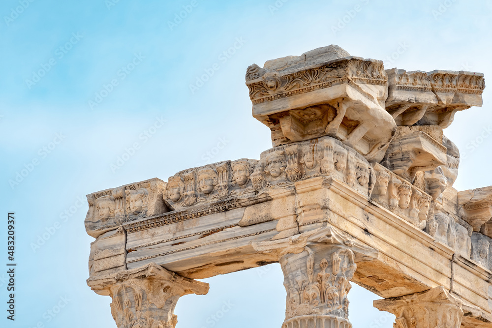 fragment of the colonnade of the destroyed temple of Apollo in Side with a stone-cut relief on the frieze