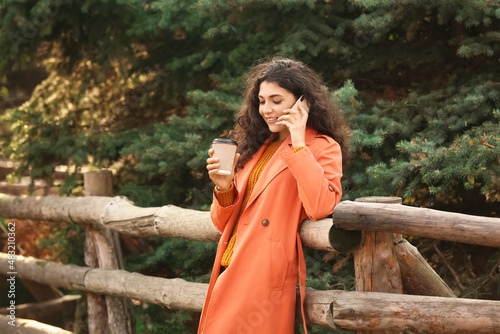 Beautiful woman drinking te...