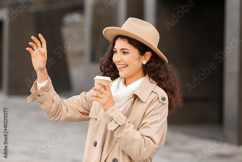 Beautiful woman drinking te...