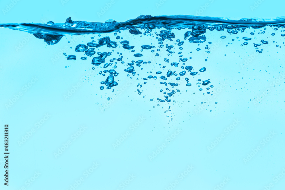 Clear water with air bubbles on blue background Clear water with air bubbles on blue background