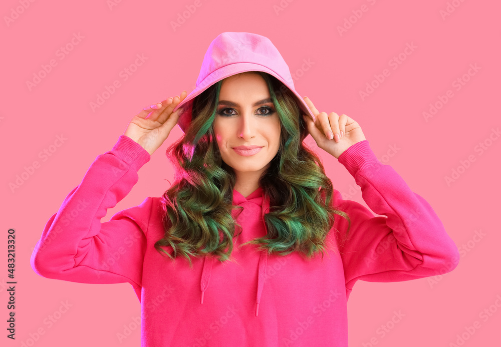 Beautiful young woman with unusual green hair on color background Beautiful young woman with unusual green hair on color background