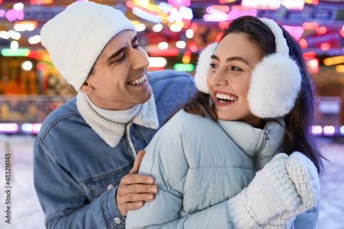 Loving couple in amusement ...