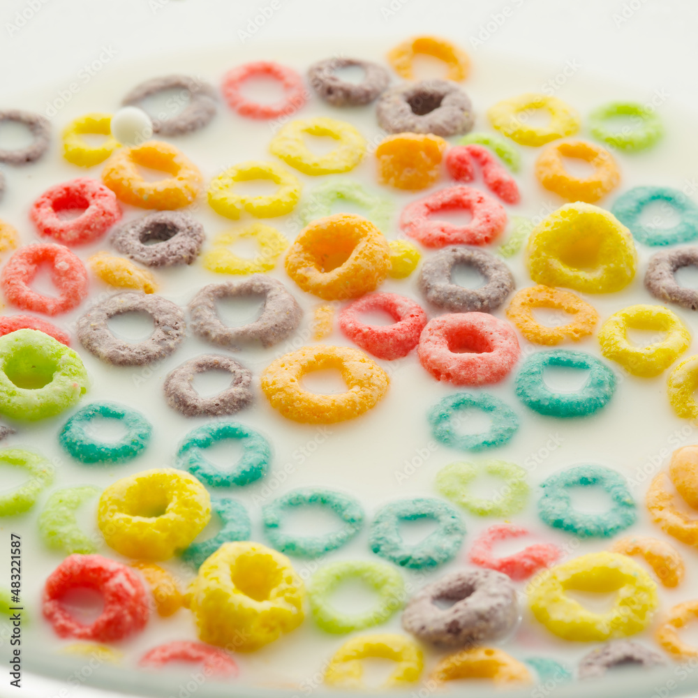 Collection of whole grain fruit colorful rings isolated on white background. Large group of objects. There are no people in the photo. Sweet food, quick breakfasts. Collection of whole grain fruit colorful rings isolated on white background. Large group of objects. There are no people in the photo. Sweet food, quick breakfasts.