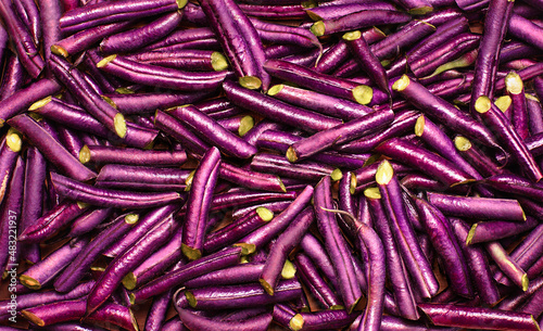 sliced purple asparagus beans background