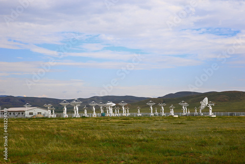 Radio telescope observatory and the blue sky white clouds