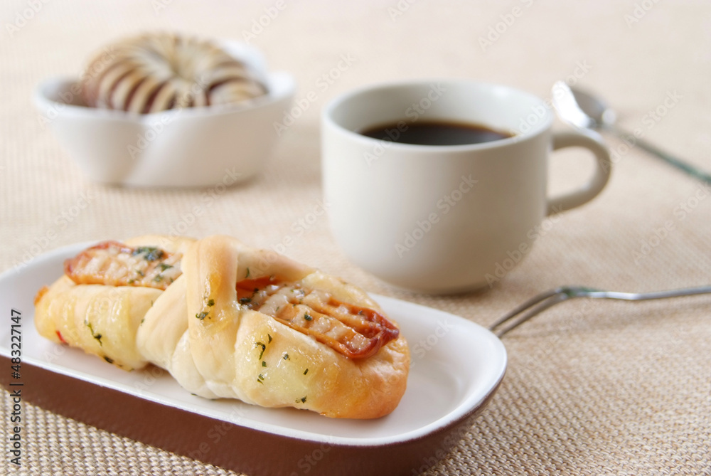 Sausage,Taro bread and cup of coffee Sausage,Taro bread and cup of coffee