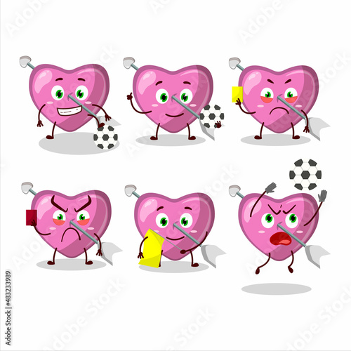 Pink cupid love arrow cartoon character working as a Football referee