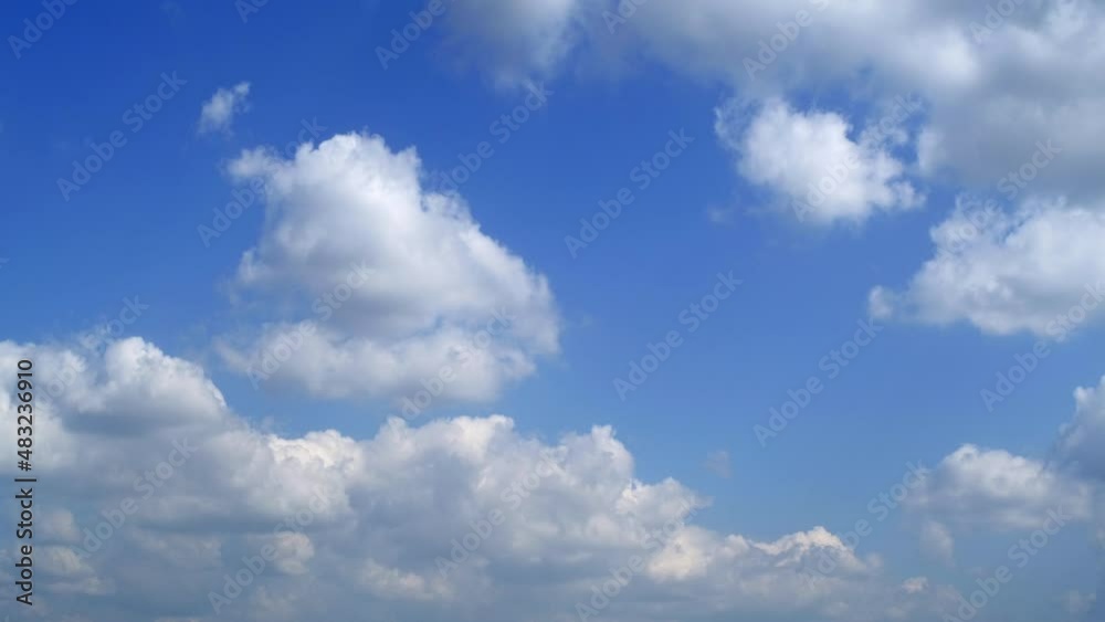 Blue sky with fluffy cloud time lapse on a sunny day 4k footage. Blue sky with fluffy cloud time lapse on a sunny day 4k footage.