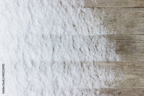 Beautiful wood planks backdrop. Wooden boards under the snow.