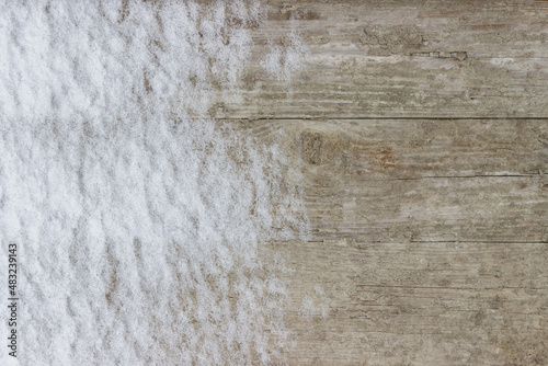 Beautiful wood planks backdrop. Wooden boards under the snow.