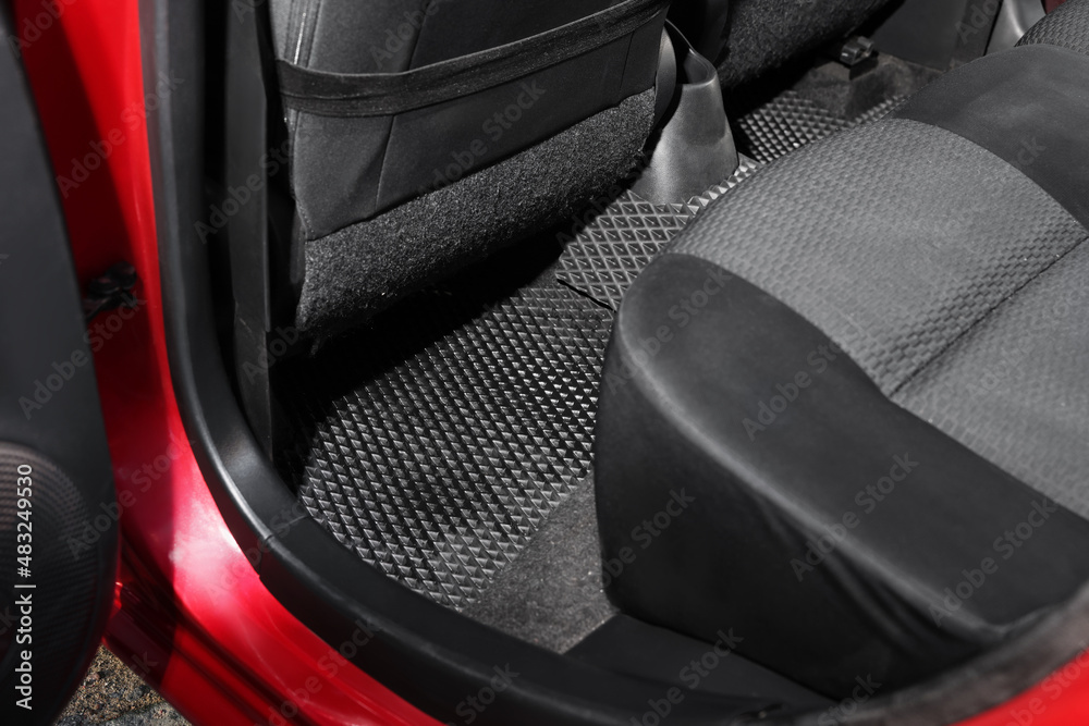 Black rubber car floor mat in auto Black rubber car floor mat in auto