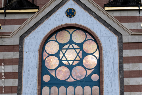 the facade of the synagogue. The star of David is in window. photo