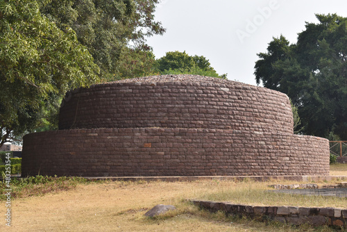 Votive Stupa near Stupa No. 3 northeast of the Great Stupa and similar in design, though smaller. Sanchi monuments, World Heritage Site, Madhya Pradesh, India. photo