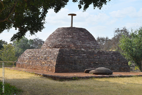 Votive Stupa near Stupa No 1 is similar in design, though smaller, Sanchi monuments, World Heritage Site, Madhya Pradesh, India. photo