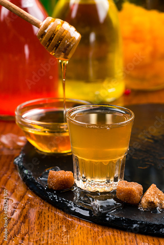 Midus is a type of Lithuanian mead, an alcoholic beverage made of grain, honey and water. Balts were making mead for thousands of years photo