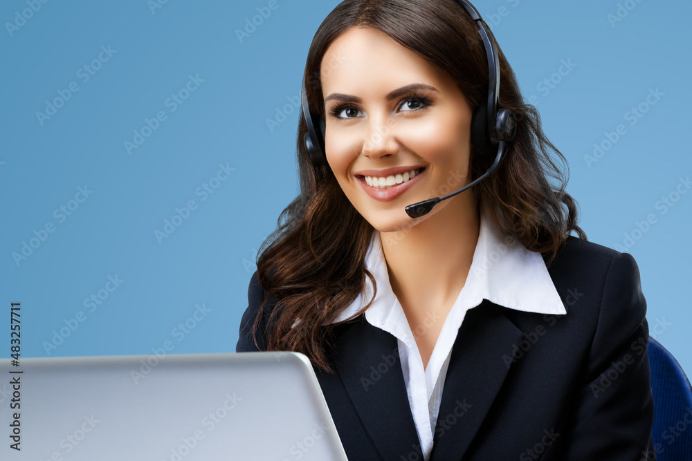 Call center. Portrait image of customer support advertiser sale operator in headset. Businesswoman or phone worker with laptop computer, inside. Answering service agent, blue color background. Call center. Portrait image of customer support advertiser sale operator in headset. Businesswoman or phone worker with laptop computer, inside. Answering service agent, blue color background.