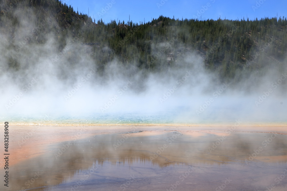 Steam clouds obscure the Grand Prismatic Spring at Yellowstone National Park, Wyoming