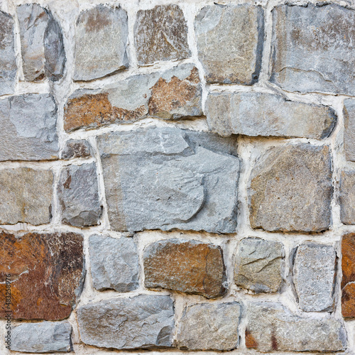 2k seamless masonry texture, with a resolution of 2048 pixels. A photo of a stone wall.