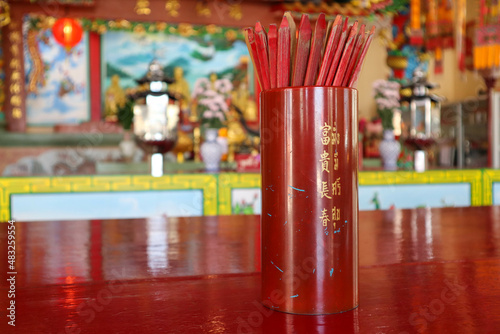 Syamsi, Siamese, The pattern red wooden stick (horoscope style Thailand),fortune cookie,fortune red wood. photo