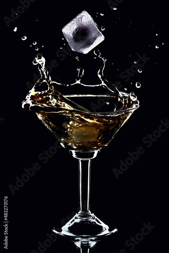 Red martini cocktail splash.