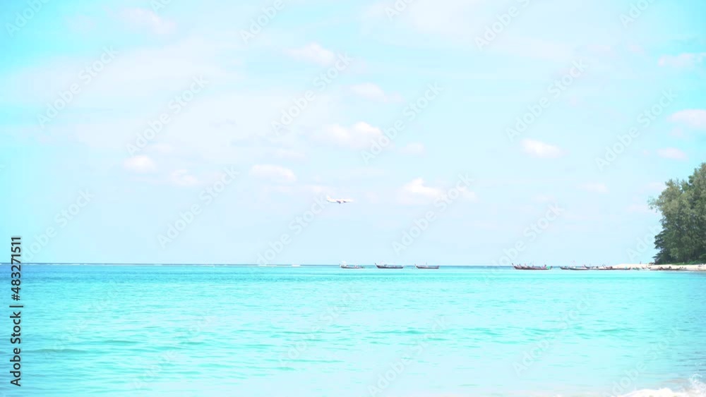 Sunrise scenery over the sea beautiful sea waves Amazing white sand and sea sun in summer Sunrise at Andaman ocean beach. Body of water. Spectacular nature view 4K. Sunrise scenery over the sea beautiful sea waves Amazing white sand and sea sun in summer Sunrise at Andaman ocean beach. Body of water. Spectacular nature view 4K.