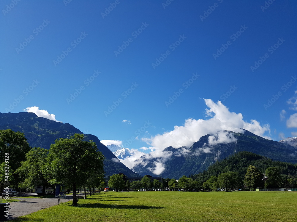 stroll while looking at the snow mountain, Interlaken, Switzerland stroll while looking at the snow mountain, Interlaken, Switzerland