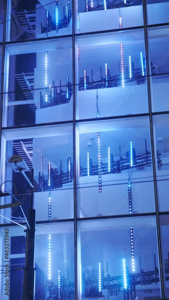Shopping mall display window with light installation during the Light Festival in Helsinki, Finland. Vertical video Shopping mall display window with light installation during the Light Festival in Helsinki, Finland. Vertical video