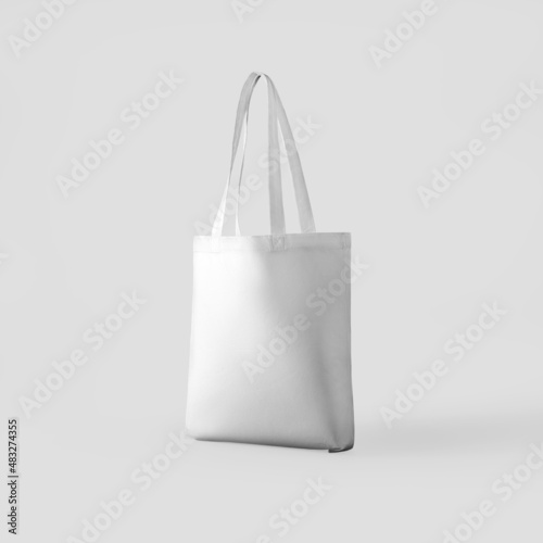 White totebag mockup 3d rendering, textured ecobag with handles, isolated on background.