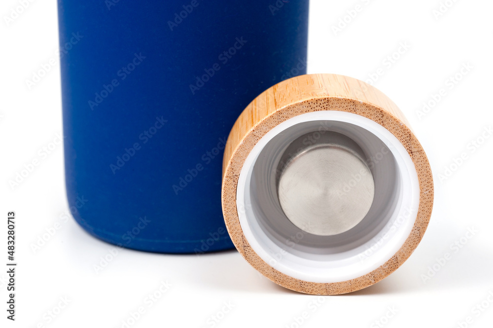 Stylish glass water bottle with wooden lid. For fitness and travel.