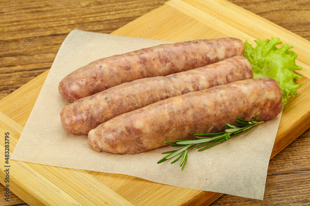 Raw pork meat sausages for grill Raw pork meat sausages for grill