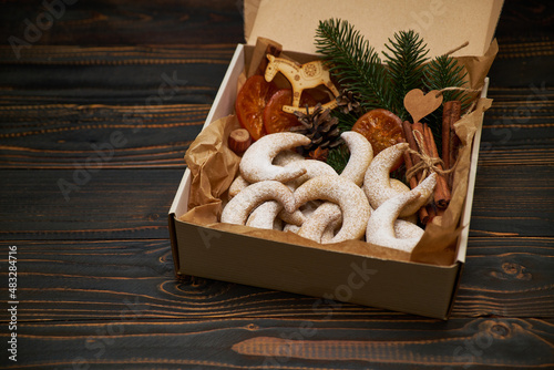 Gift box full of Traditional German or Austrian Vanillekipferl vanilla kipferl cookies photo