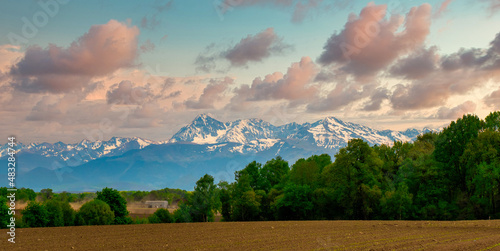Panorama of countryside, french Pyrenees mountains in background photo