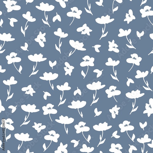 Beautiful vintage pattern. White flowers and leaves . Blue-gray background. Floral seamless background. An elegant template for fashionable prints.