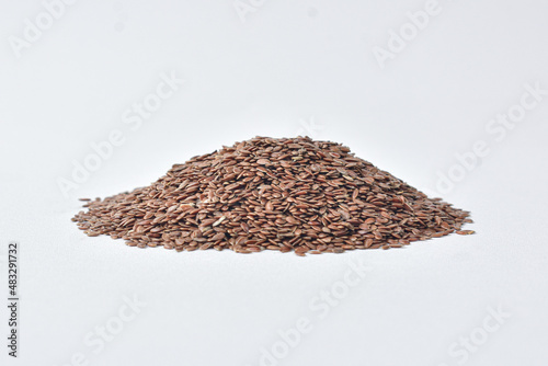 natural brown flaxseed white background