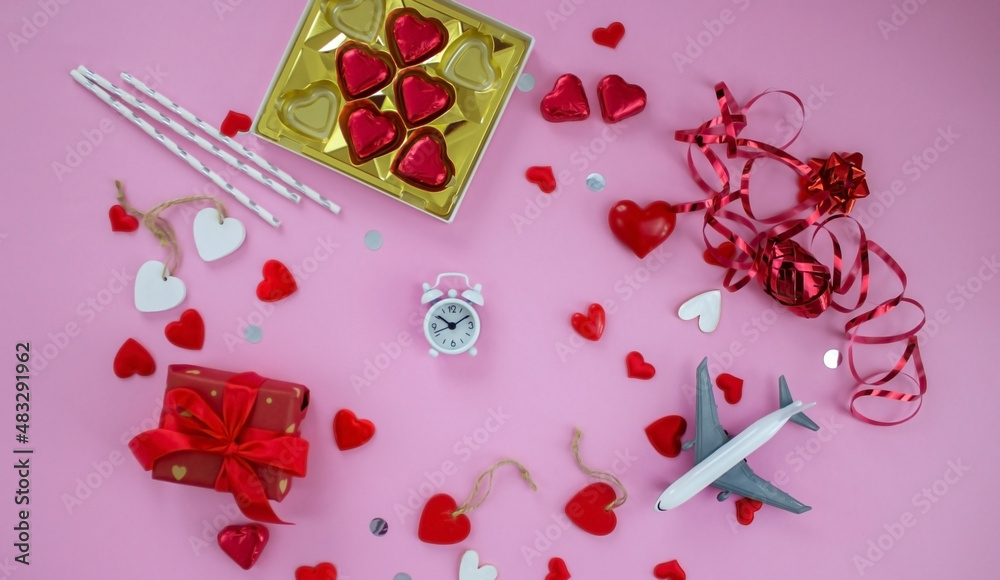 Valentine's Day holiday concept. On a pink background, valentine's day. Airplane travel. Valentine's Day holiday concept. On a pink background, valentine's day. Airplane travel.
