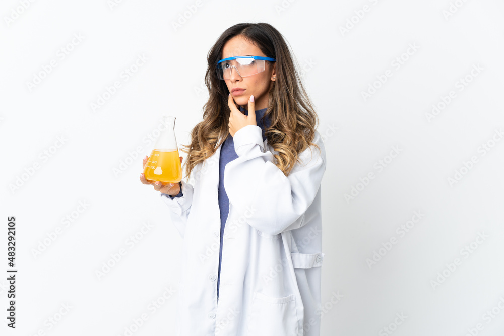 Young scientific woman isolated on white background having doubts Young scientific woman isolated on white background having doubts