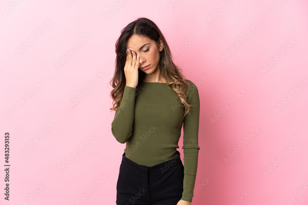 Young caucasian woman isolated on pink background with headache Young caucasian woman isolated on pink background with headache