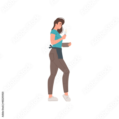 Smiling woman casual housewife in apron cooking pastry dessert whipped cream in bowl vector flat © provectors