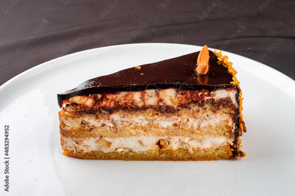 Cake with caramel nuts and chocolate frosting. Cake with caramel nuts and chocolate frosting.