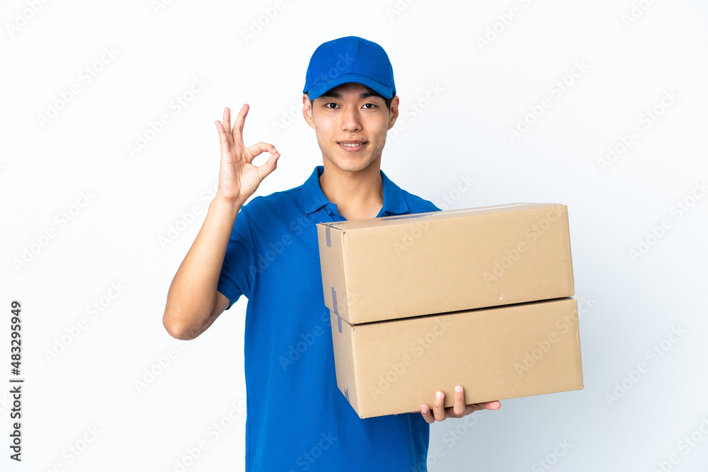 Delivery Chinese man isolated on white background showing ok sign with fingers Delivery Chinese man isolated on white background showing ok sign with fingers