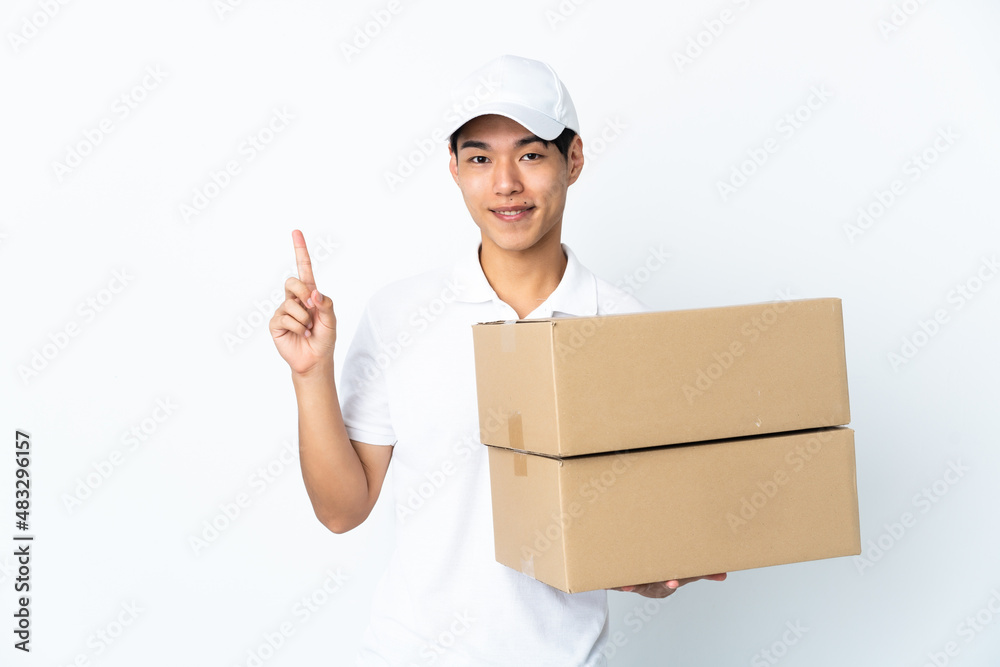 Delivery Chinese man isolated on white background showing and lifting a finger in sign of the best Delivery Chinese man isolated on white background showing and lifting a finger in sign of the best