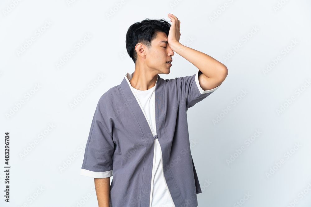 Young Chinese man isolated on white background has realized something and intending the solution Young Chinese man isolated on white background has realized something and intending the solution