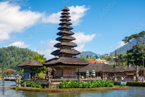 Bali water temple on Bratan Lake is the most beautiful temple in Bali, Indonesia. Pura Ulun Danu Beratan Temple, or Pura Bratan is located by the lake and surrounded by forested mountains.