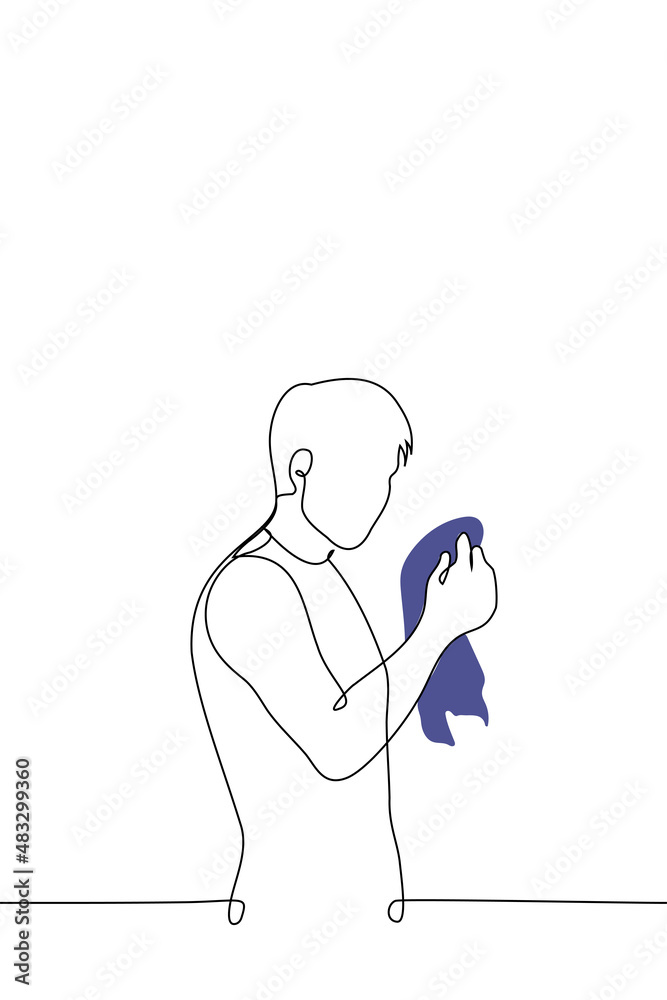 man wants to dry his face with towel - one line drawing vector. concept after washing, after shower, wet with sweat