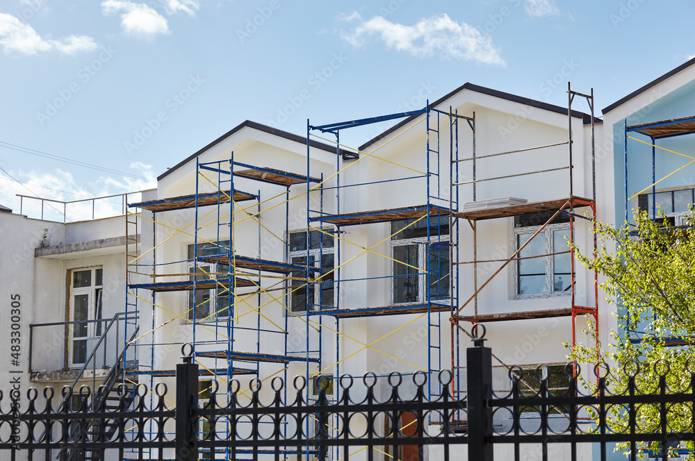 The progress of construction of the kindergarten building. Modern decoration of building facades The progress of construction of the kindergarten building. Modern decoration of building facades
