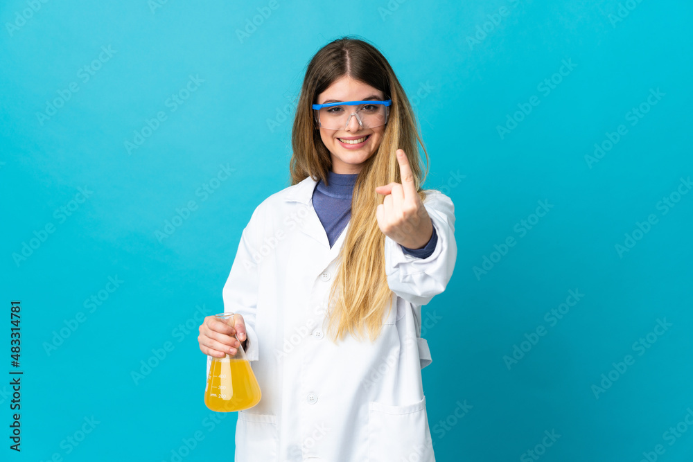 Young blonde scientific woman isolated on blue background doing coming gesture