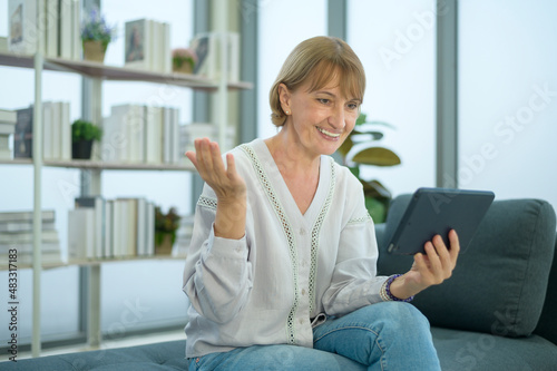 Free Download Happy Caucasian senior woman video call to family or friends, relax at home, smiling healthy senior retired grandparents, older grandparent technology concept - GFXLoad